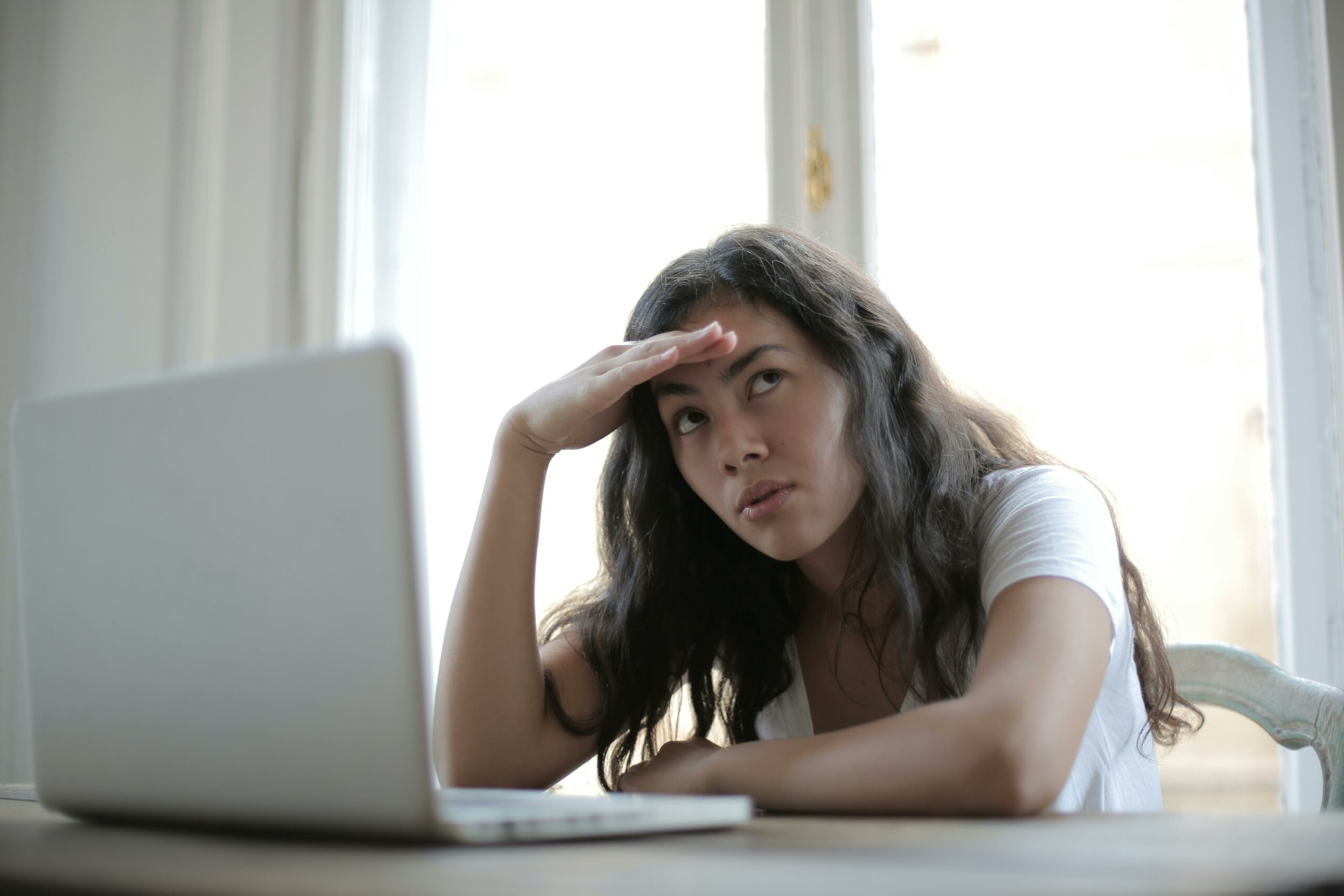 Understanding financial statement image with a woman looking at her laptop confused. Photo by Andrea Piacquadio: https://www.pexels.com/photo/young-annoyed-female-freelancer-using-laptop-at-home-3808008/